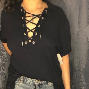 Polo with lace up front.